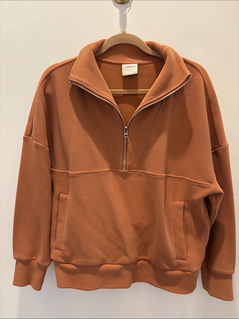 Varley women’s Colebrook half-zip Pullover in Rust Orange